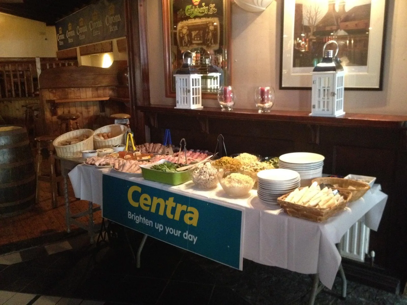 A buffet table prepared with a selection of food for a function